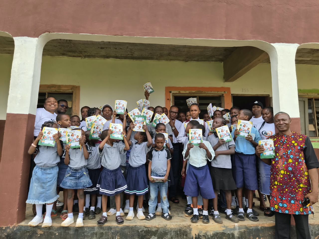 Students and school staff gathered during the outreach