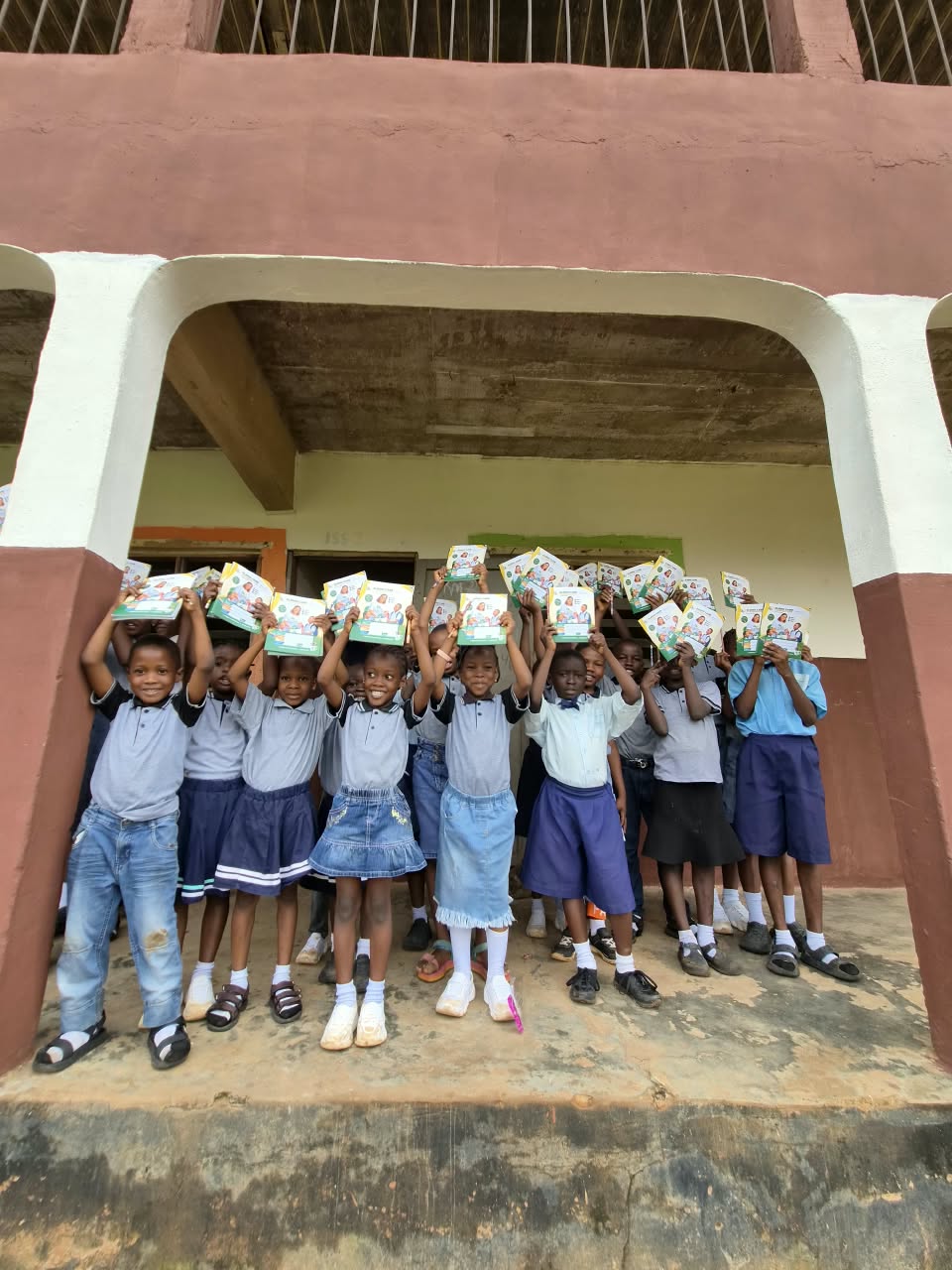Students and volunteers together during a school outreach