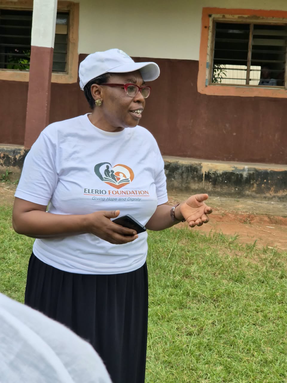 An Elerio volunteer speaking to the community
